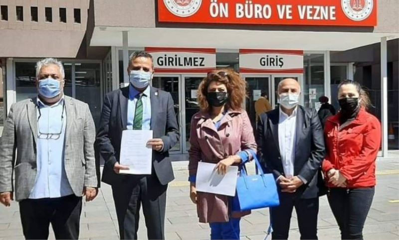 Ütebay, pankartlarin toplatilmasini mahkemeye tasidi